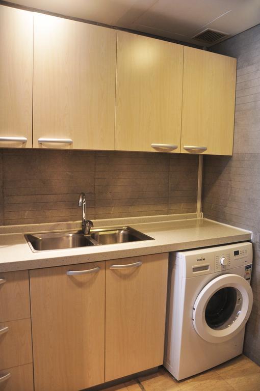 Hotel Nikko Tiencin Zewnętrze zdjęcie A laundry room